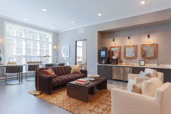 a living room with couches and a coffee table